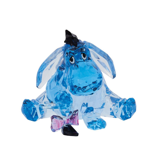 Disney Eeyore Facets Figurine  Gloomy Eeyore is not a fan of much, but his loyalty wins the hearts of his friends every time he loses his tail. The beloved character makes his debut in the Disney Facets Collection of acrylic figures that look like cut crystal. Collect them all.