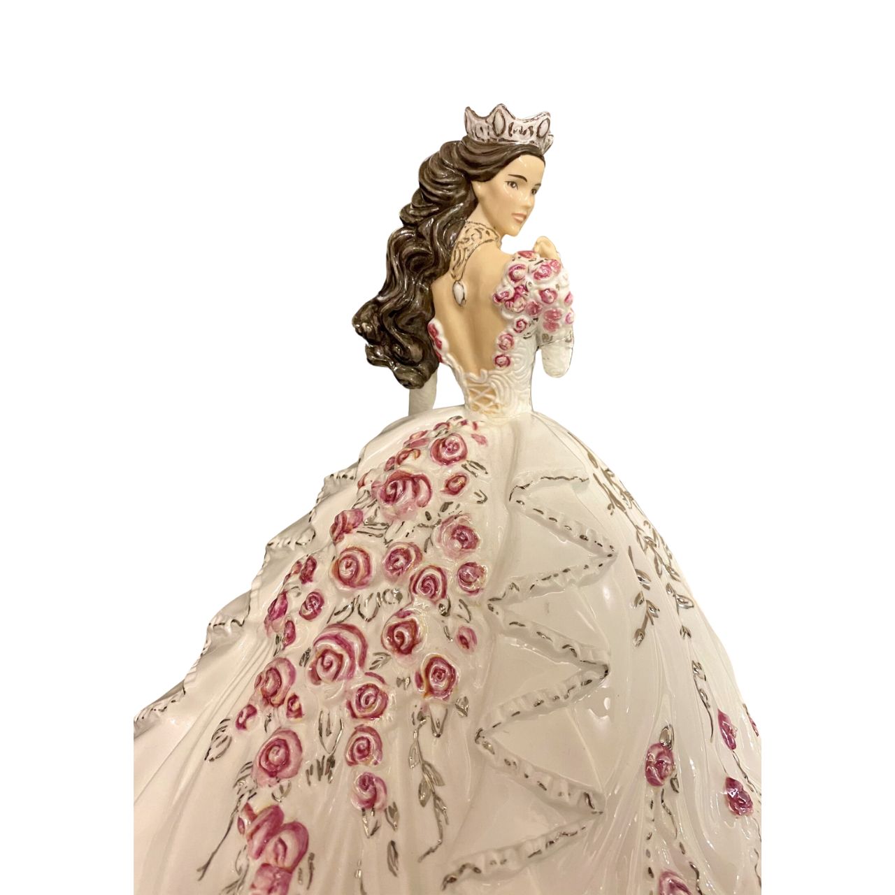 English Ladies Company Gypsy Rose Brunette  Thelma Madine’s stunning gown is recreated in this elegant bone china figurine.  Floral details spill down the back of the dress and across the shoulders; with real platinum highlights adding the finishing touches.