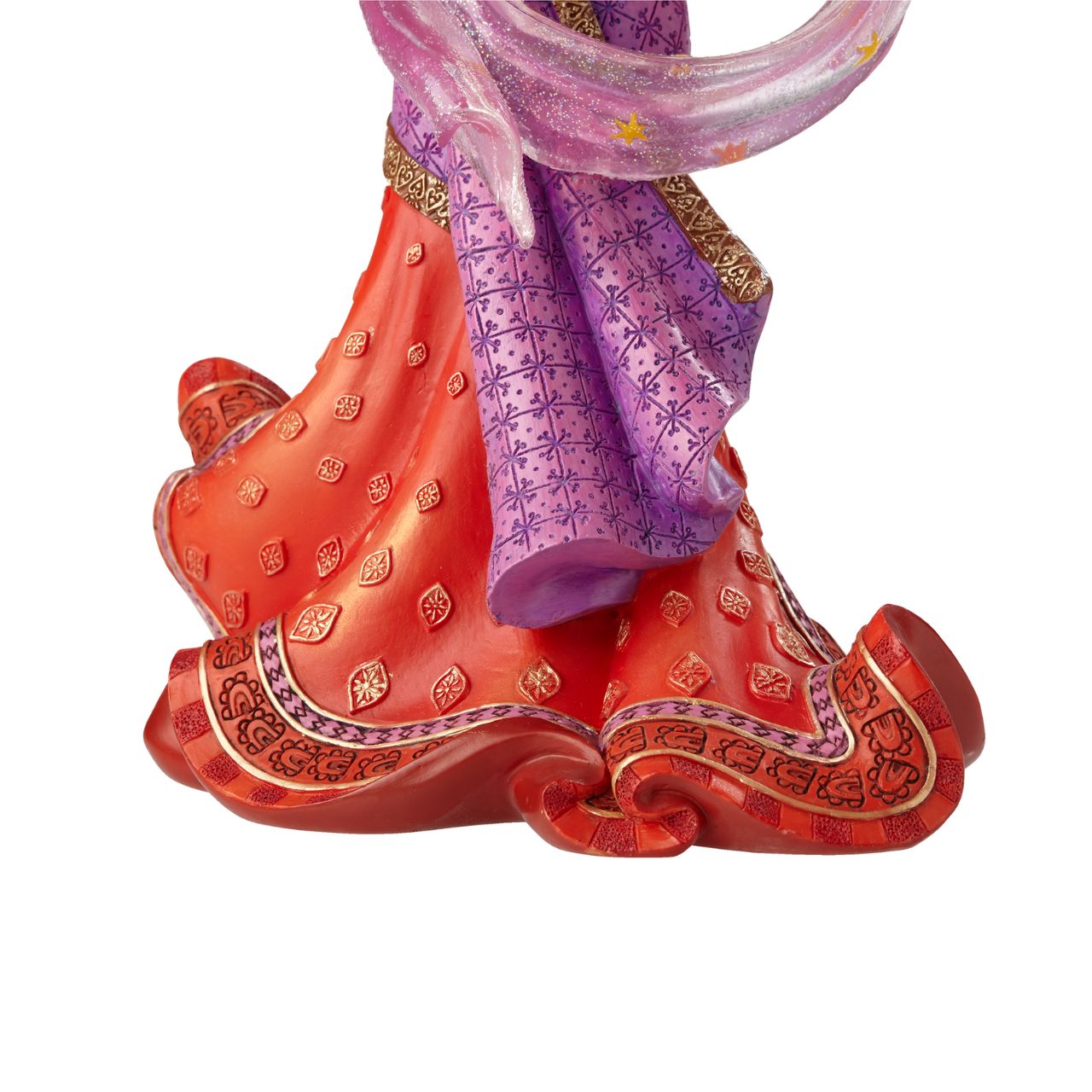 Making her debut into Disney Showcase is the finest girl in France, Esmeralda from the classic film Hunchback of Notre Dame. This stunning twentieth anniversary cast stone figurine depicts Esmeralda in her red dress and shimmering star scarf; the fluidity and movement of the fabrics have been perfectly captured.