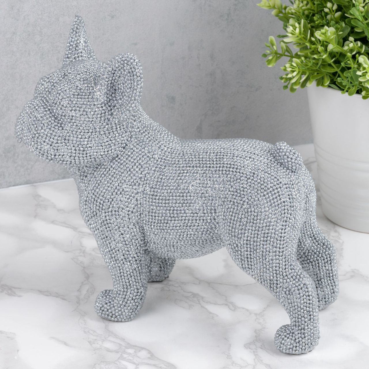 Bring a touch of glitz and glamour to the living space with this diamante look silver Bulldog ornament. From the Silver Luxe collection by HESTIA - unparalleled glamour, style and elegance in contemporary home and gift.