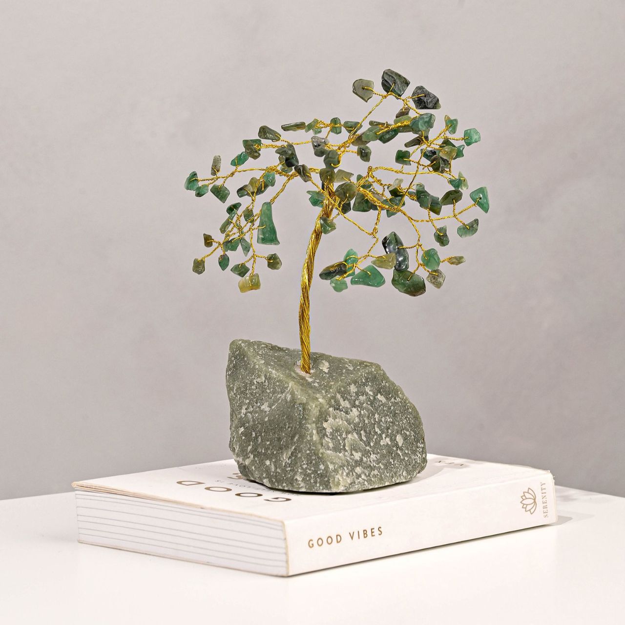 This vivid gemstone tree radiates positive energy around living spaces.