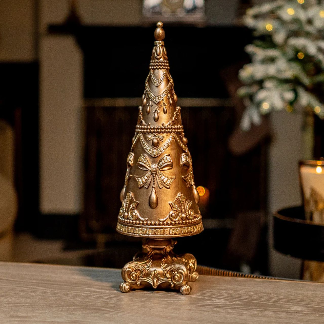 Capture the essence of timeless elegance with our Genesis Christmas Tree Ornament. Adorned with classical details and meticulously crafted in cold cast bronze, this sculpture brings a touch of sophistication to holiday décor.