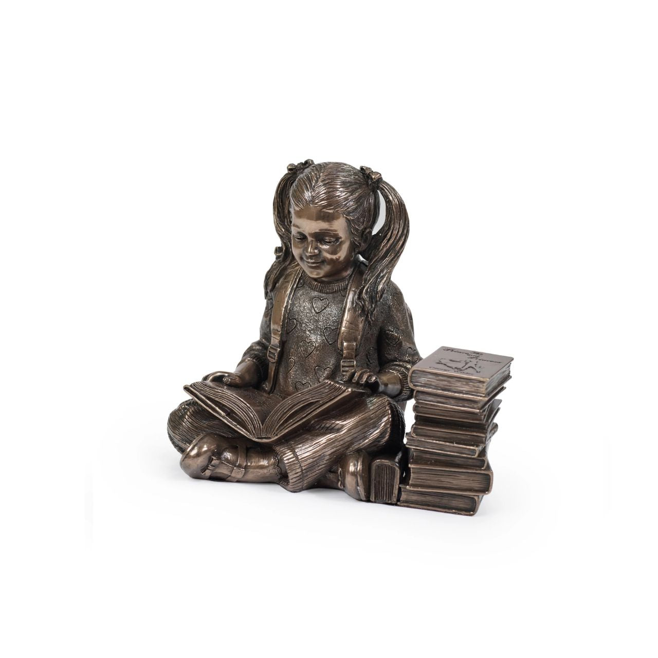 Elevate the essence of literary charm with this enchanting small sculpture a portrayal of a young girl immersed in the world of imagination.