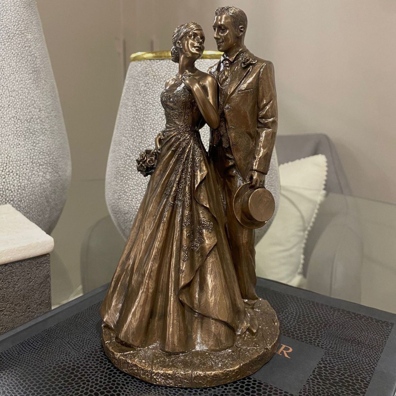 This beautiful piece, the married couple, is a perfect wedding gift as it depicts the unity and magic of love in a perfect partnership, beautifully crafted in a cold cast bronze.