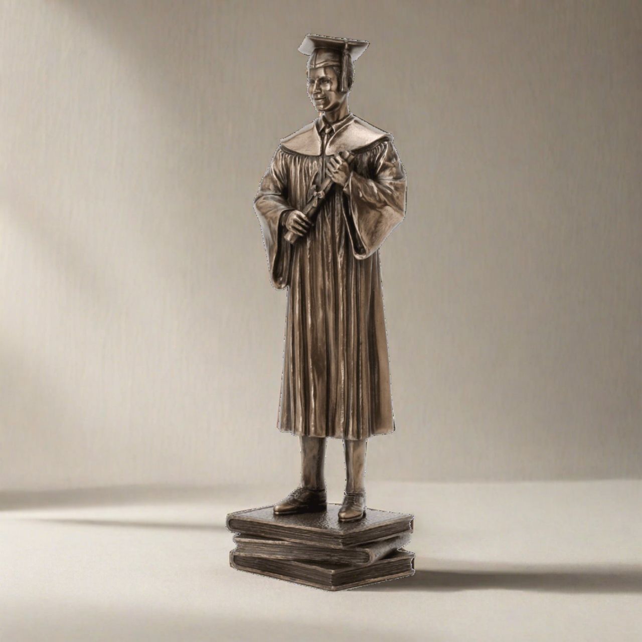 This stunning bronze figurine of a young man on his graduation day would make the perfect graduation gift.