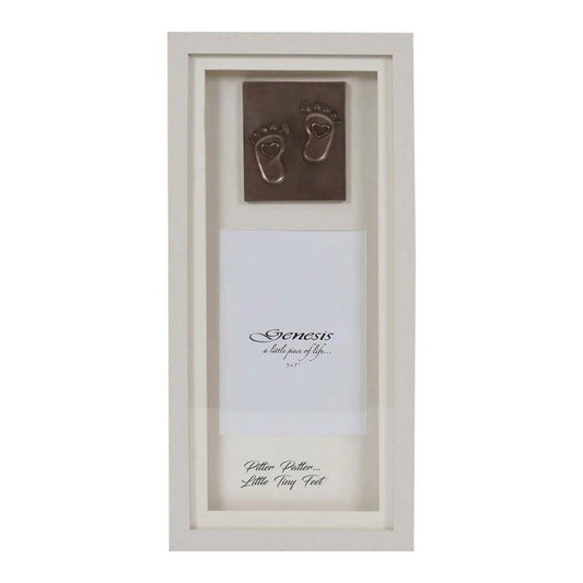 A gorgeous faux blond wood frame, showcasing tiny little feet in cast bronze with a space for a 5 x 7'' photo and the inscription, "Pitter Patter... Little Tiny Feet" at the bottom of the frame.