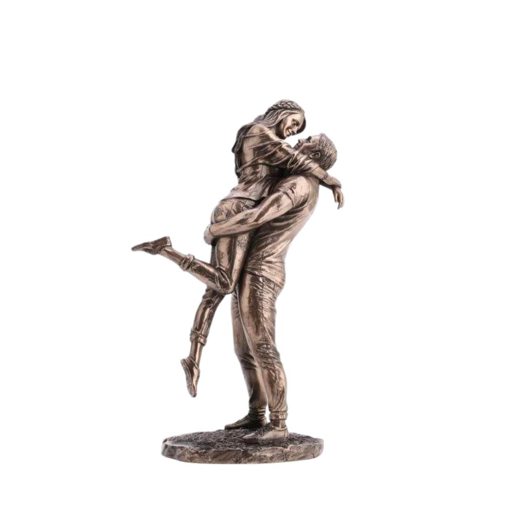 The Promise by Genesis Ireland  A beautiful bronze coloured statue of a couple in a loving embrace.  Perfect for art lovers or for an occasional gift such as a engagement or anniversary gift.