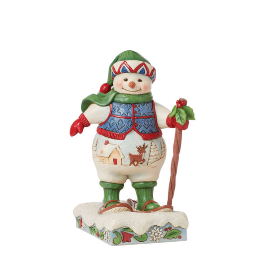 This festive figurine is the cutest Snowman, ready for the ice with his snowshoes. From the Heartwood Creek collection from Jim Shore. Comes in fully branded packaging.