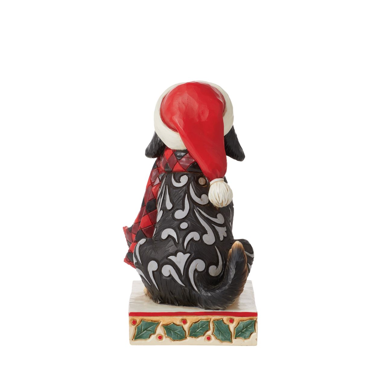 Heartwood Creek Highland Glen Dog in Santa Hat Figurine  Designed by award winning artist Jim Shore as part of the Heartwood Creek Highland Glen Collection, hand crafted using high quality cast stone and hand painted, this cute & cosy dog is perfect for the Christmas season.