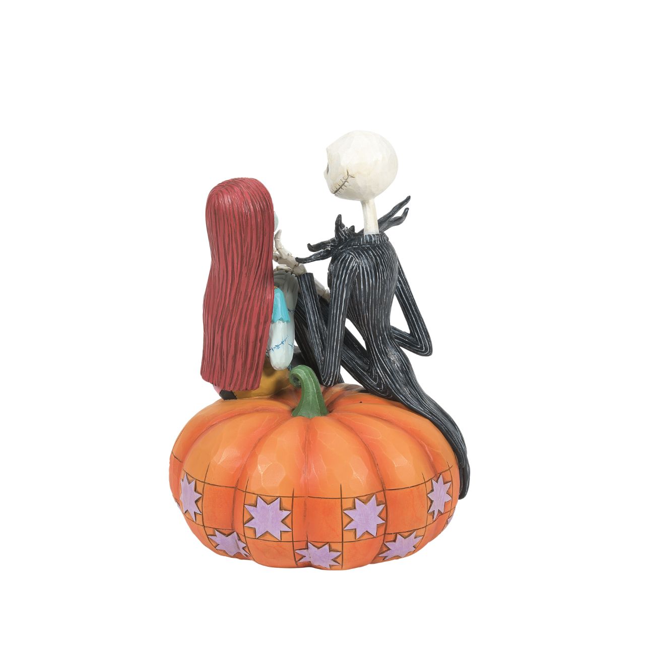 Jack and Sally sit atop a pumpkin in this Halloween themed figurine. The perfect gift for any Nightmare before Christmas fans or happy couples who love all things spooky. Designed by Jim Shore. Hand painted and hand carved. Comes in fully branded gift box.