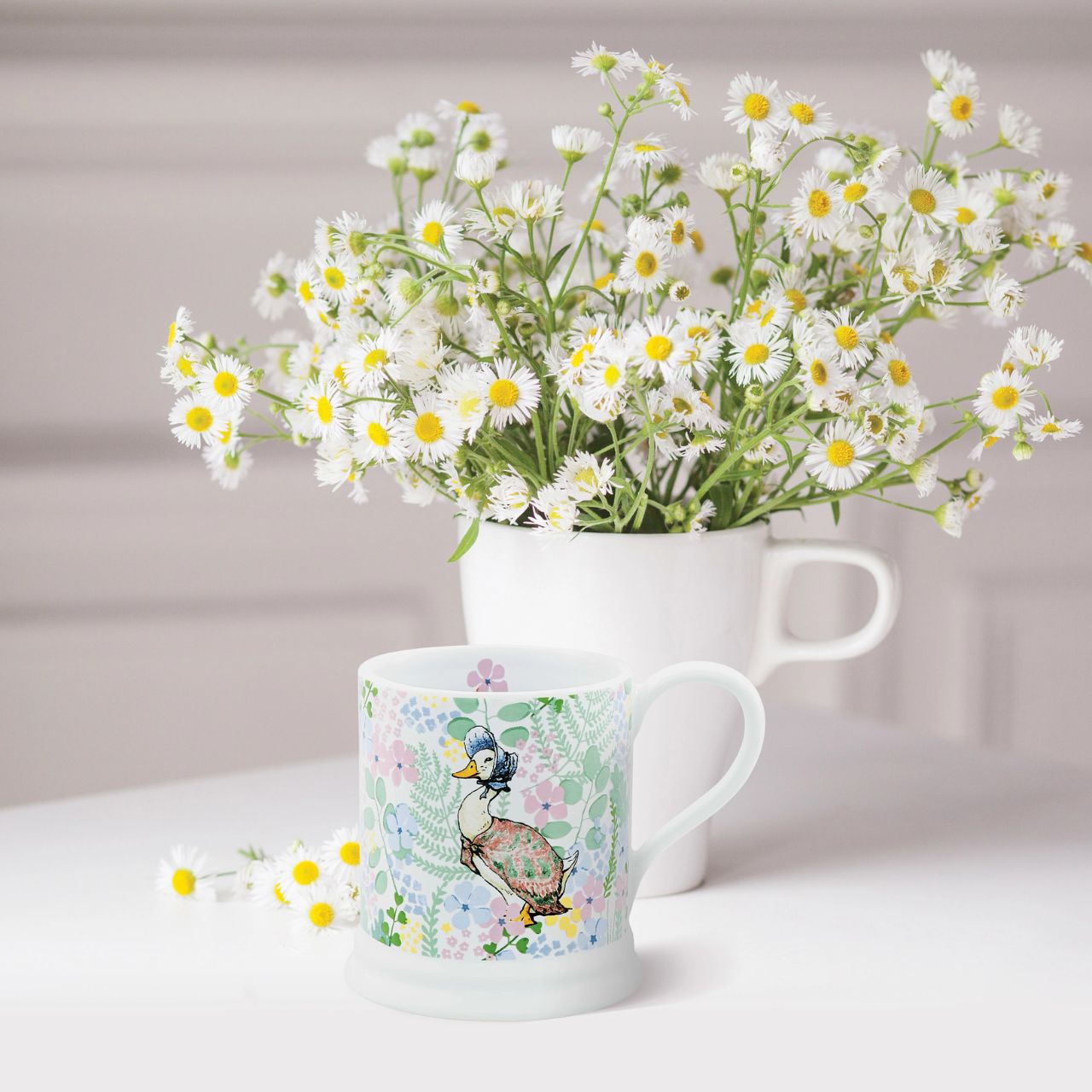 The English Garden collection combines high-quality practical products with Beatrix Potter's timeless characters. Designed in the UK, the range takes inspiration from the original Beatrix Potter illustrations to create beautifully stylish home decor and accessories. The English Garden Mug is a gorgeous piece of tableware and makes a stylish gift for Beatrix Potter fans.