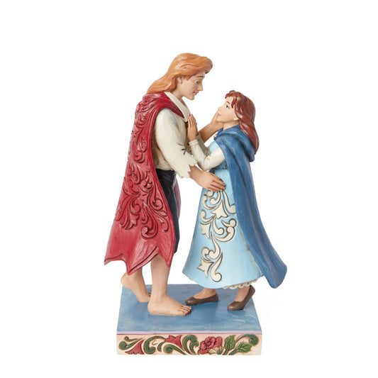 The iconic couple of Belle and her prince, just moments after he is turned back from the beast into a human. A perfect sentiment of love, no matter what. From the Disney Traditions collection.