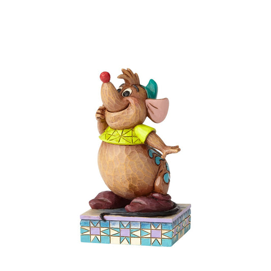 Gus-Gus may not be the smartest mouse in Cinderella's loyal bunch, but he is certainly one of the most lovable. This charming design shows the always-hungry Gus eagerly anticipating a yummy snack, his round belly protruding beneath a snug green tee. 