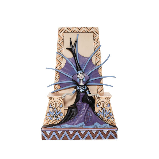 The devious diva, Yzma, yearns for power as she conspires a poisonous plot to unsurp the throne from Emperor Kuzco. Jim Shore's design captures the villain Yzma's personality from Disney's Emperor's New Groove in this intricately hand-painted and detailed sculpt.