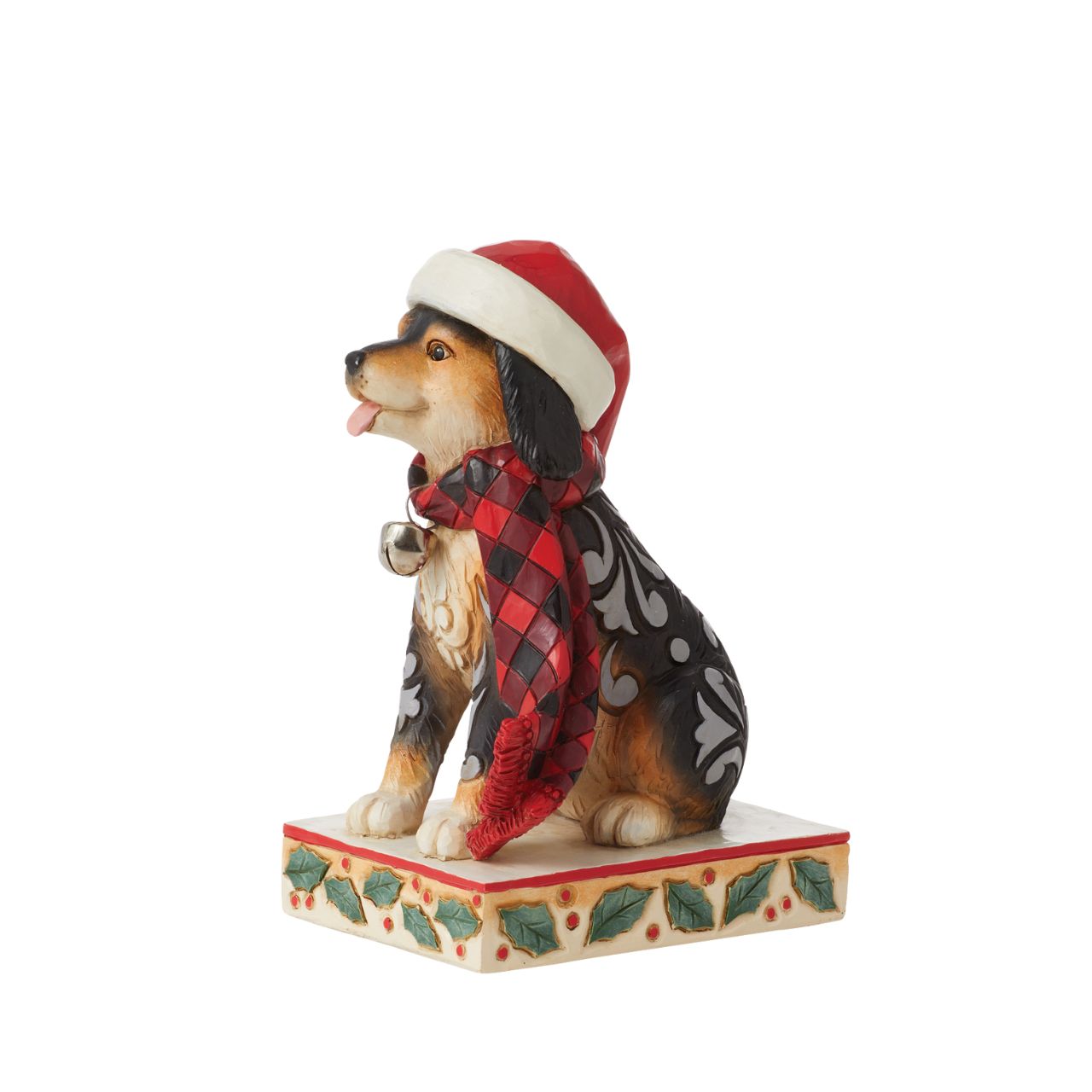 Heartwood Creek Highland Glen Dog in Santa Hat Figurine  Designed by award winning artist Jim Shore as part of the Heartwood Creek Highland Glen Collection, hand crafted using high quality cast stone and hand painted, this cute & cosy dog is perfect for the Christmas season.