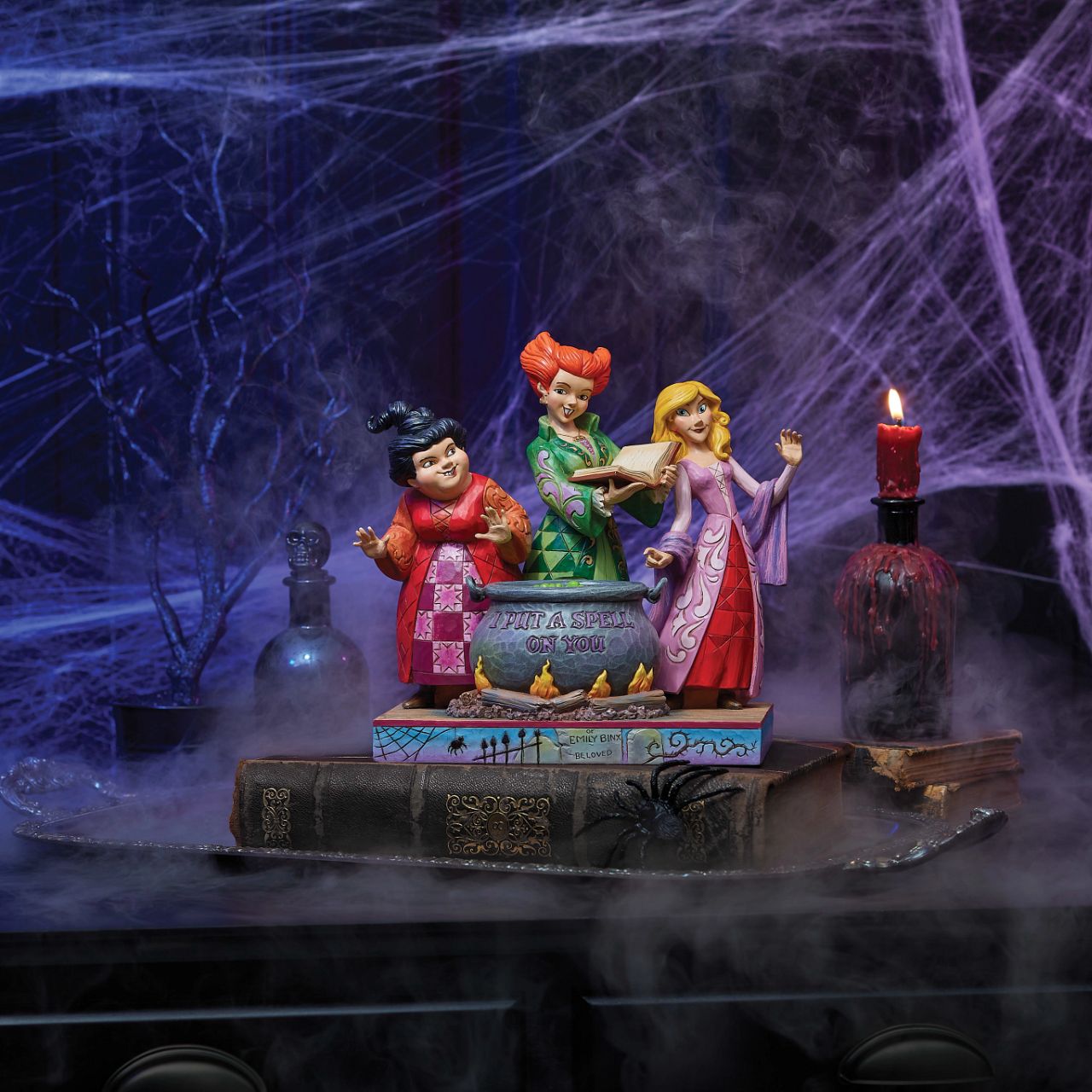 The Sanderson sisters gather round their cauldron in a piece guaranteed to "put a spell on you" Designed by the award winning artist and sculptor, Jim Shore for the Disney Traditions brand.