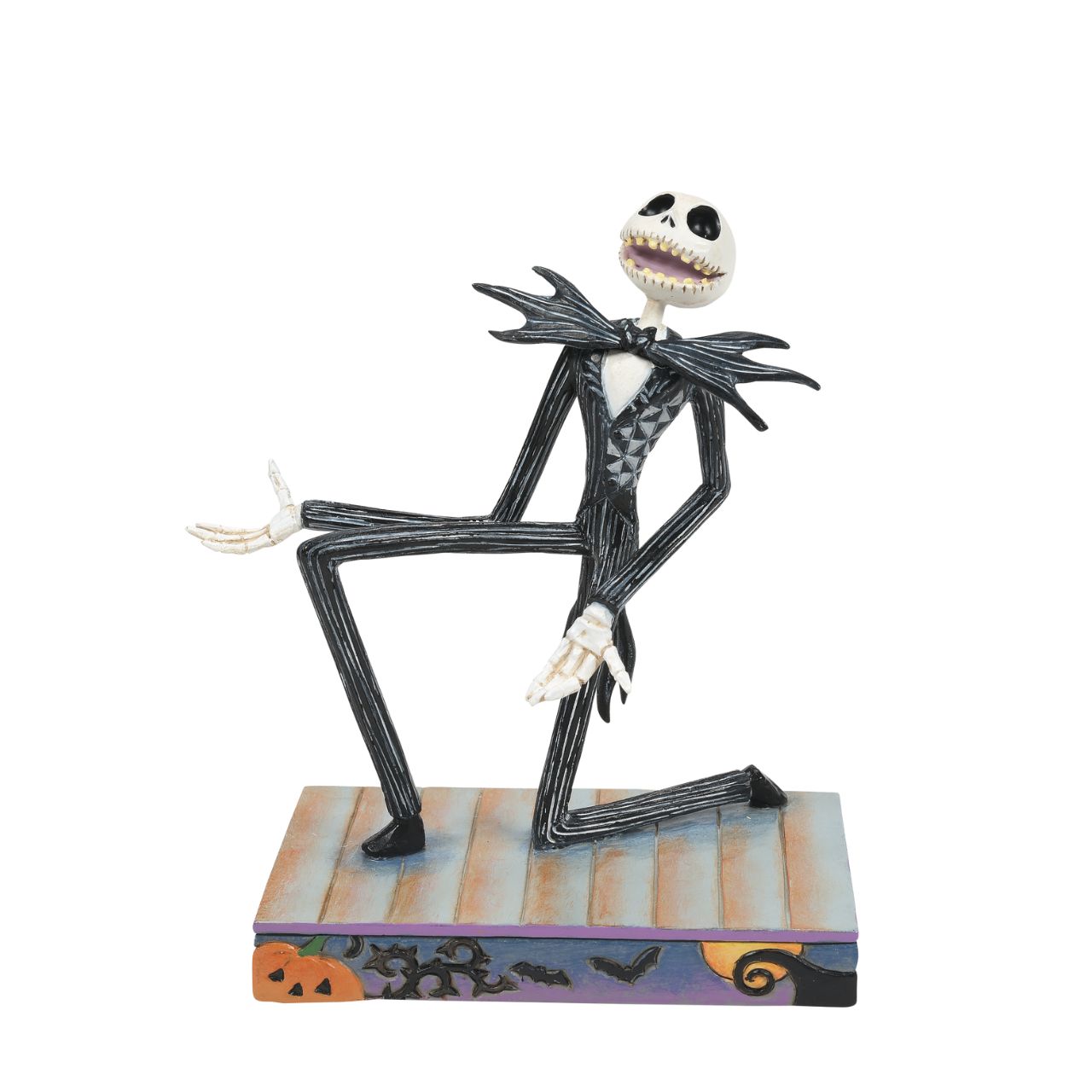 Jack Skellington Personality Pose Figurine  Jack Skellington is down on one knee and looks delighted. in his iconic black and white stripe suit and Bat bow-tie, he is on a Halloween themed base, even featuring a Jack-O-Lantern peeking out of the corner. Designed by Jim Shore for the Disney Traditions collection, this is the perfect Nightmare Before Christmas piece for any fan.