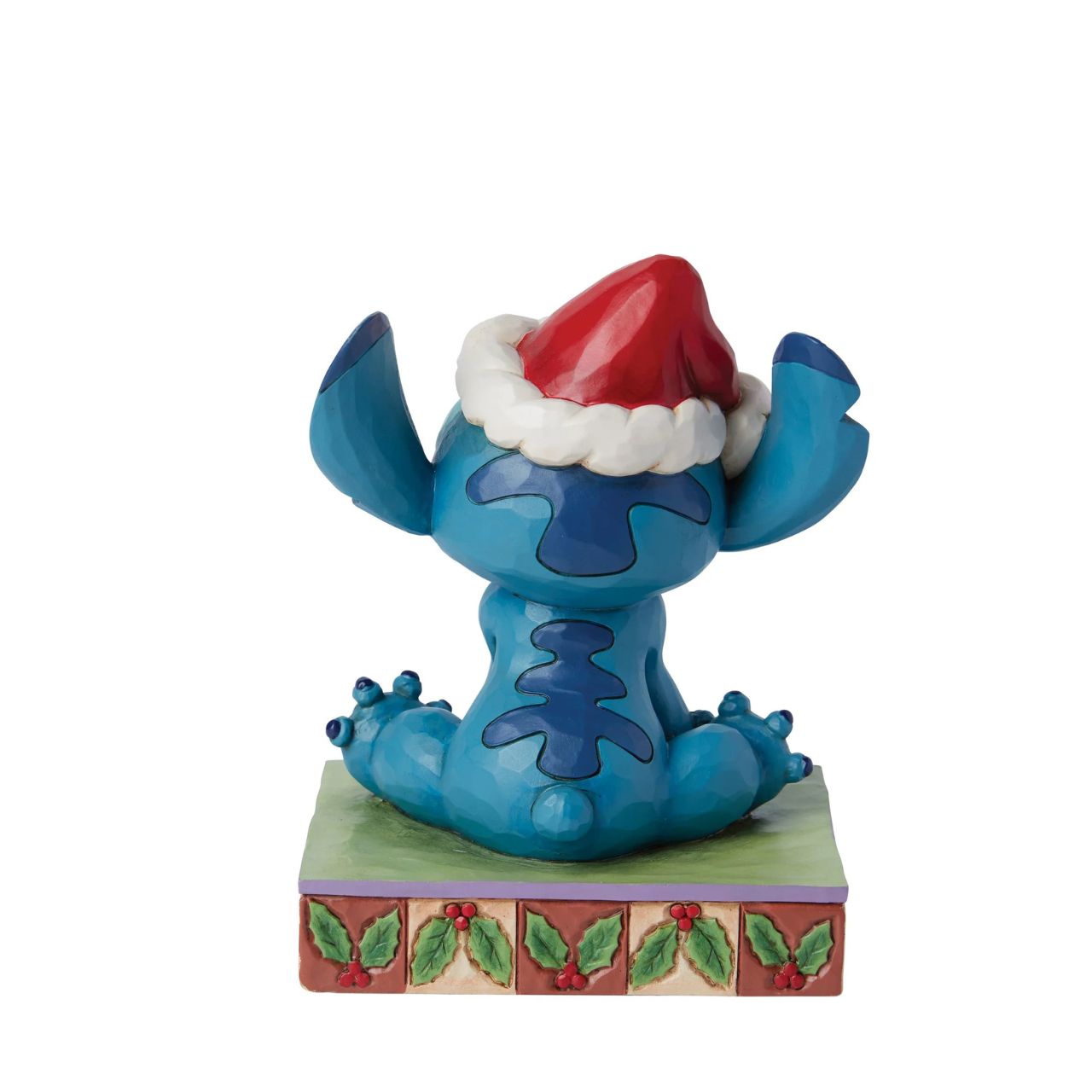 Stitch and his little friend Scrump are all ready for Santa with their festive hats. The perfect addition to any Christmas display from Disney Traditions. Comes in a fully branded gift box.