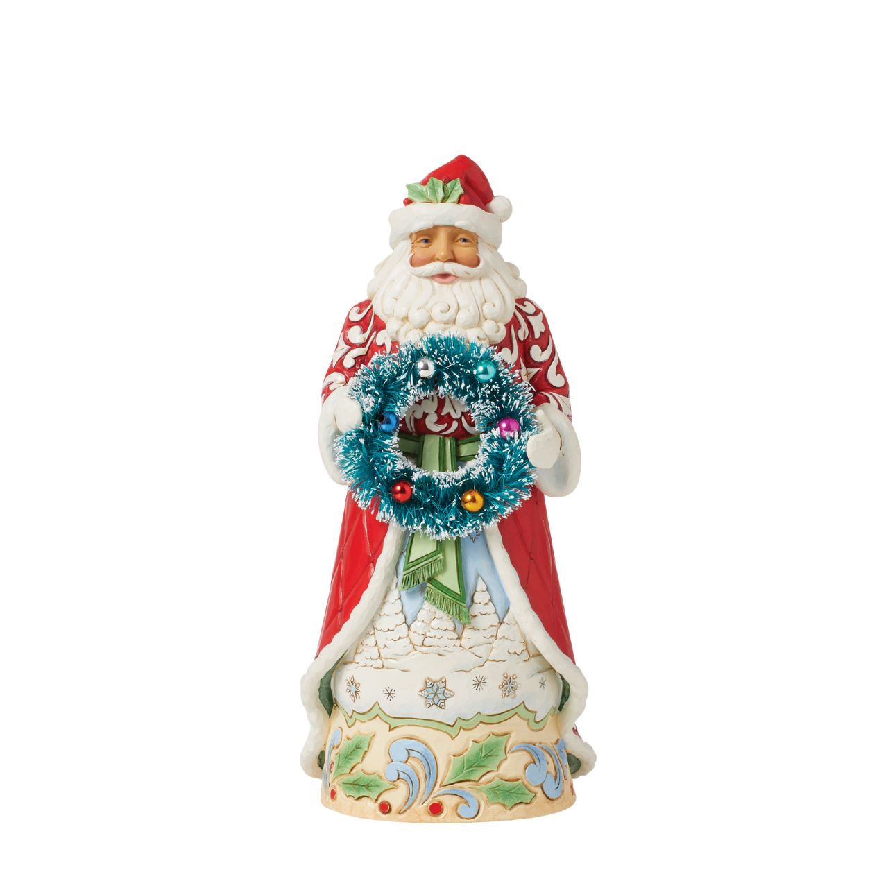 A hand painted Santa figurine by Jim Shore as part of his Heartwood Creek collection, featuring a sisal wreath to add extra fun and texture to the piece. Perfect to add to any Christmas display. Comes in fully branded packaging.