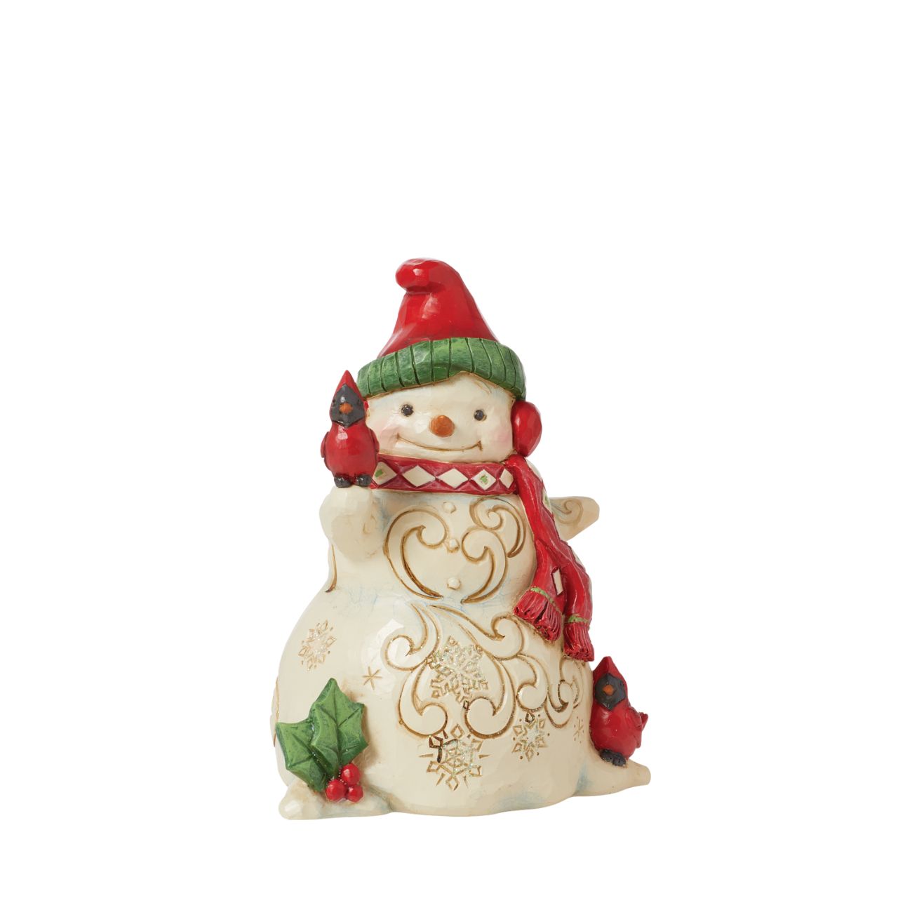 Wrapped up against the winter chill and with a little Cardinal friend, this Snowman is ready for the Christmas period. Hand painted and hand carved from the Heartwood Creek collection from Jim Shore.