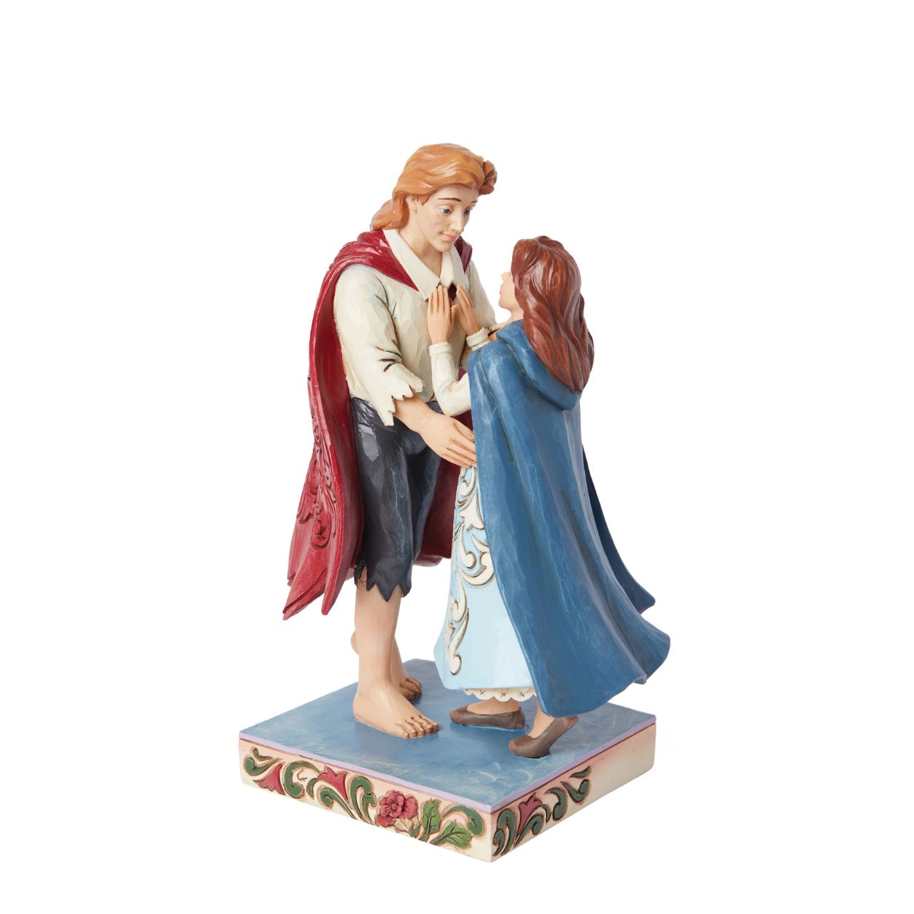 The iconic couple of Belle and her prince, just moments after he is turned back from the beast into a human. A perfect sentiment of love, no matter what. From the Disney Traditions collection.