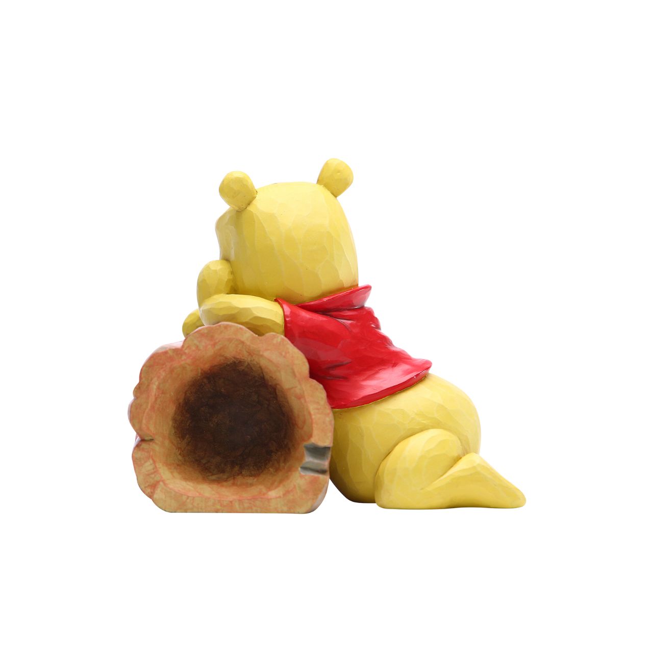 Jim Shore's Pooh and Piglet on a Log Figurine Truncated Conversation  Friends Winnie the Pooh and Piglet share a thoughtful moment together in the One Hundred Acre Wood. Folk art-inspired details add to the artisanal charm of this hand-painted figurine, sculpted from high-quality cast stone.