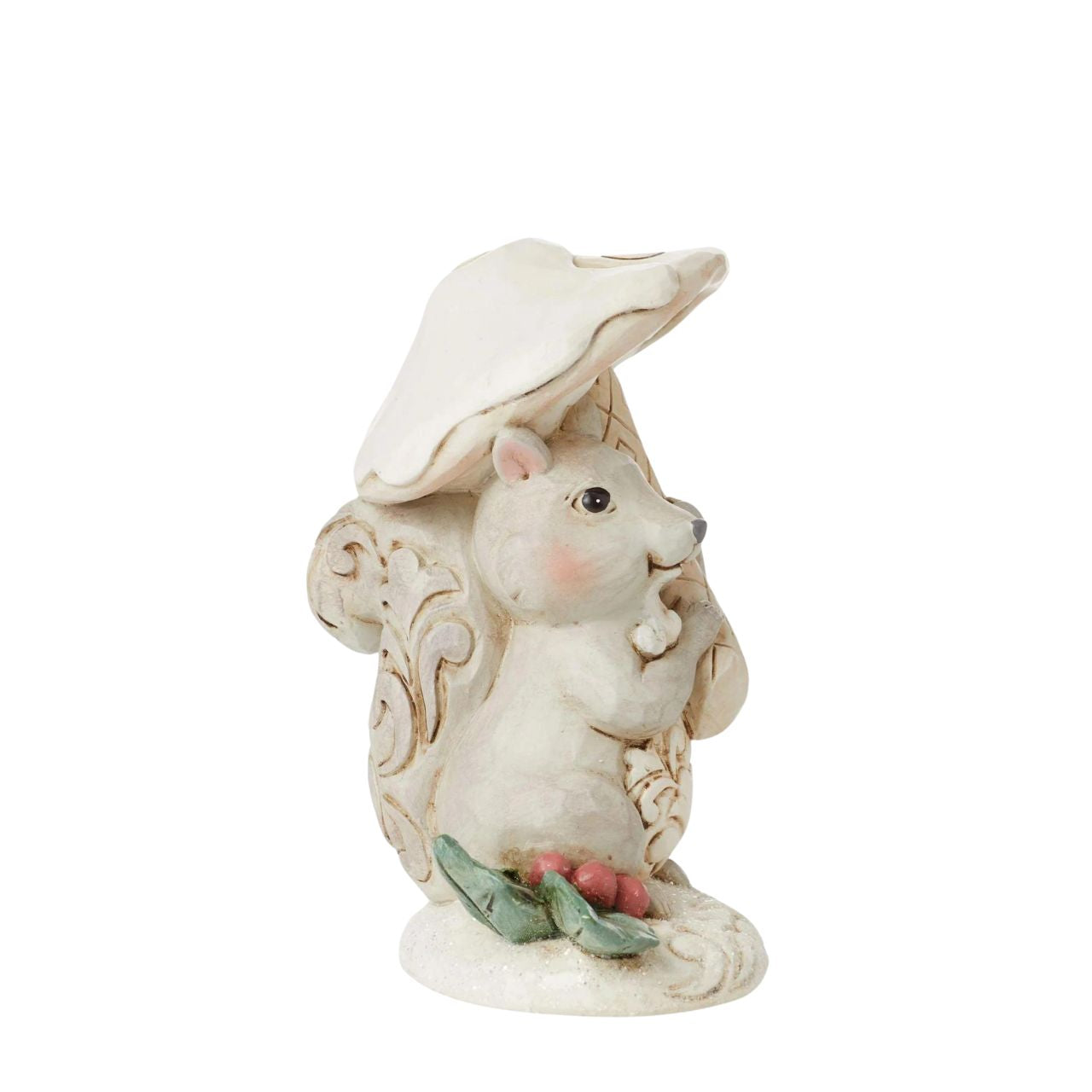 The White Woodland Collection showcases Intricate Jim Shore designs, with soft neutral colour palette suitable for many styles of home decor. This cute little squirrel holding a mushroom is the perfect addition to any White Woodland Collection. Hand painted in high quality cast stone. 