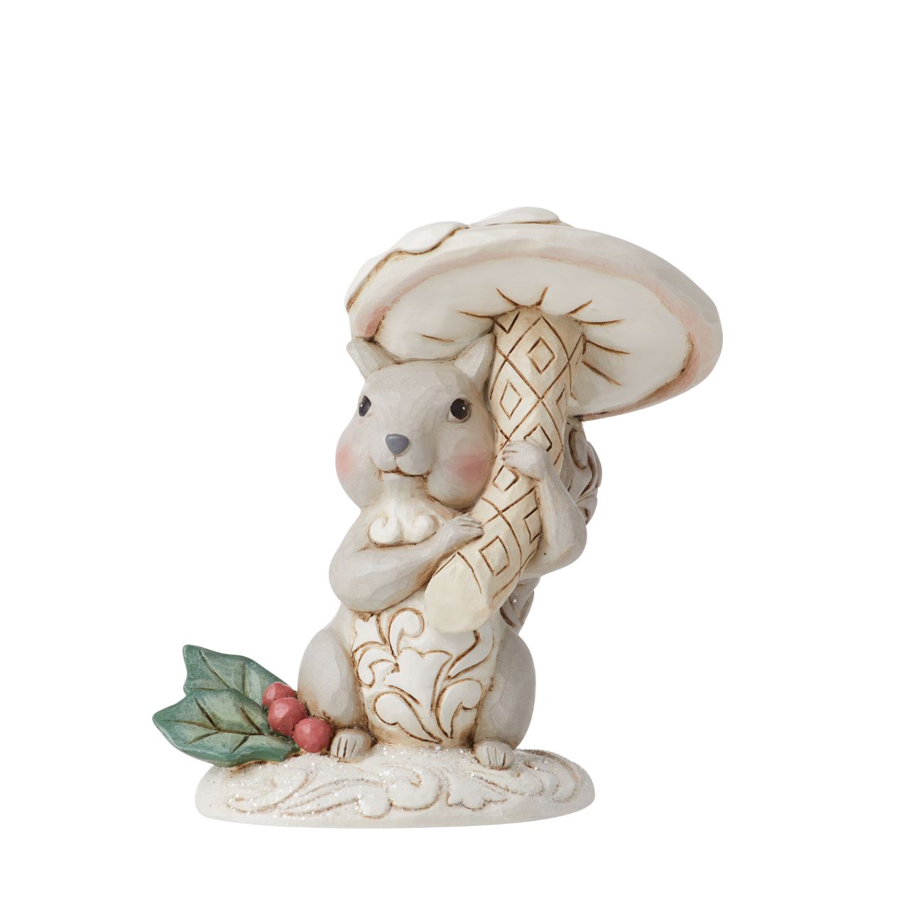 The White Woodland Collection showcases Intricate Jim Shore designs, with soft neutral colour palette suitable for many styles of home decor. This cute little squirrel holding a mushroom is the perfect addition to any White Woodland Collection. Hand painted in high quality cast stone. 