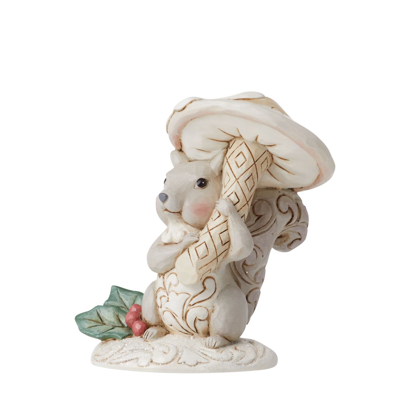 The White Woodland Collection showcases Intricate Jim Shore designs, with soft neutral colour palette suitable for many styles of home decor. This cute little squirrel holding a mushroom is the perfect addition to any White Woodland Collection. Hand painted in high quality cast stone. 