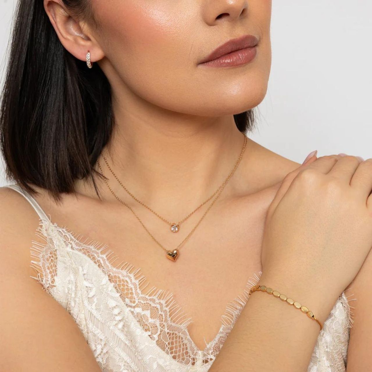 Discover timeless elegance with Knight & Day Classic Gold Hoops. These hoops, crafted by Knight & Day, exude sophistication and style. Gold plated, they are perfect for any occasion. Elevate any outfit with these versatile and classic hoops. Experience luxury with Knight & Day.