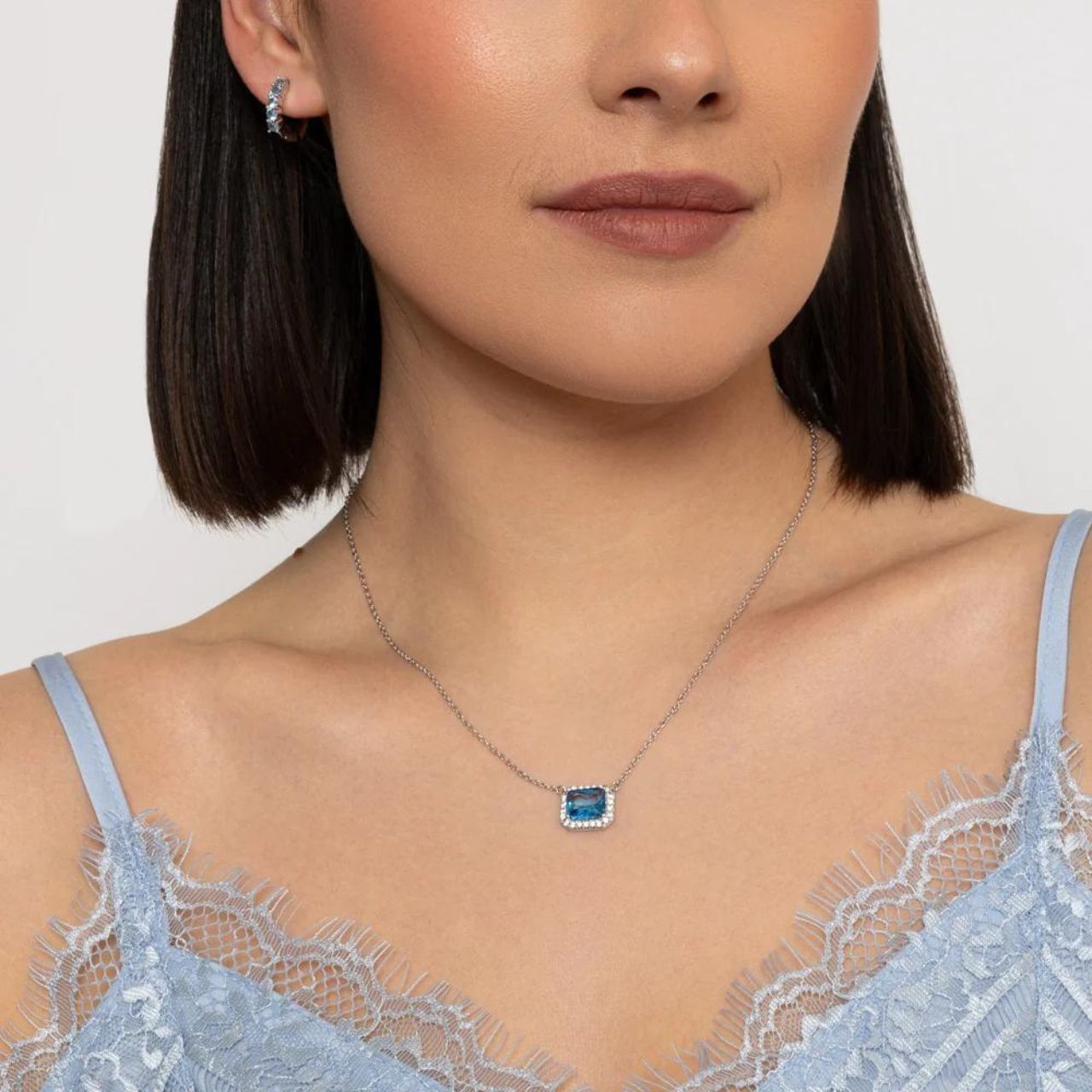 Add a touch of elegance to any outfit with the Emmie Light Blue Crystal Earrings by Knight & Day. These stunning earrings feature light blue crystals that catch the light for a dazzling effect. These earrings are the perfect accessory for any occasion.