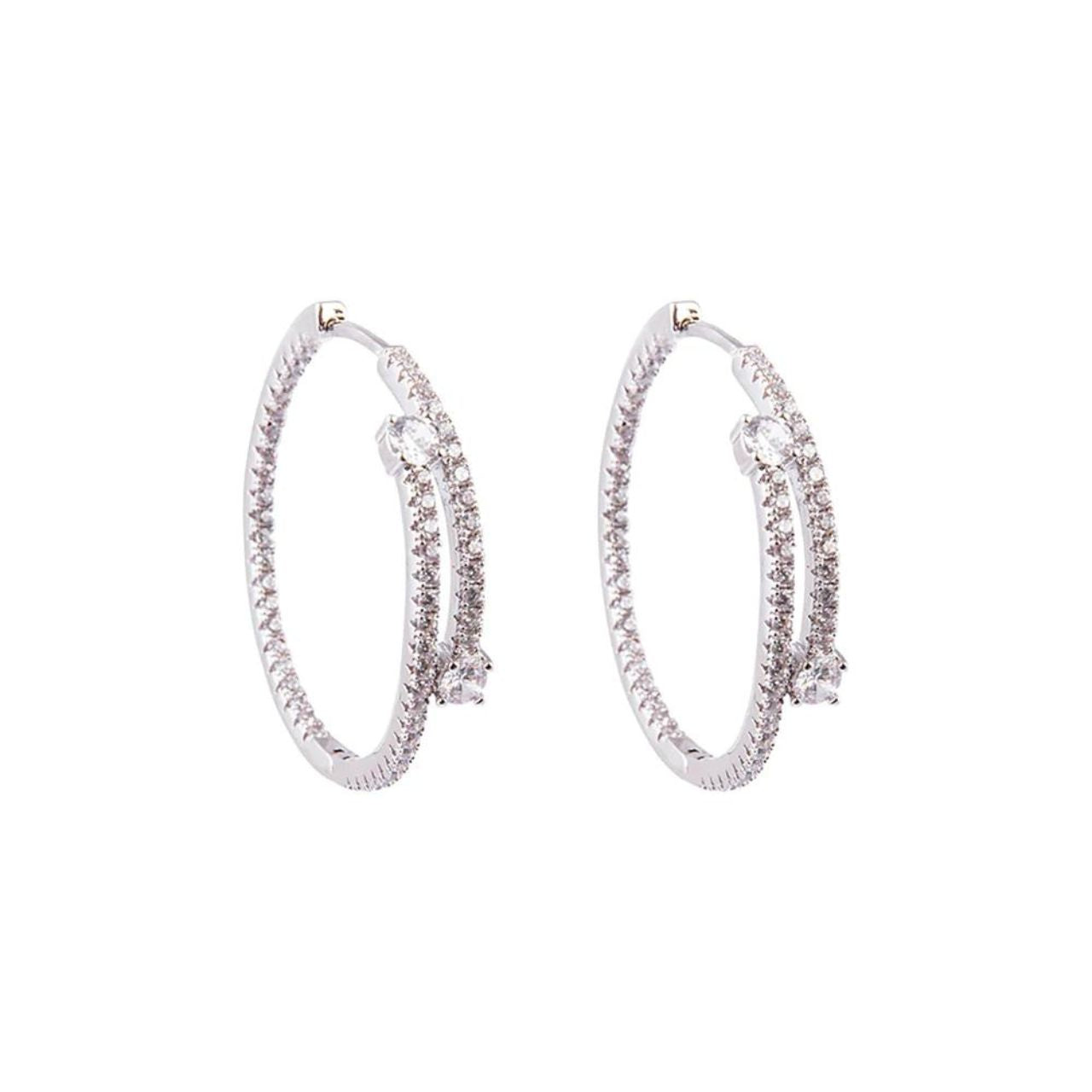 Rhodium Emily Hoop Earrings by Knight & Day  Add a touch of sparkle to any look with Knight & Day's Rhodium Emily Hoop Earrings. Crafted from rhodium for a lasting shimmer, these unique earrings will add a sophisticated touch to any outfit.