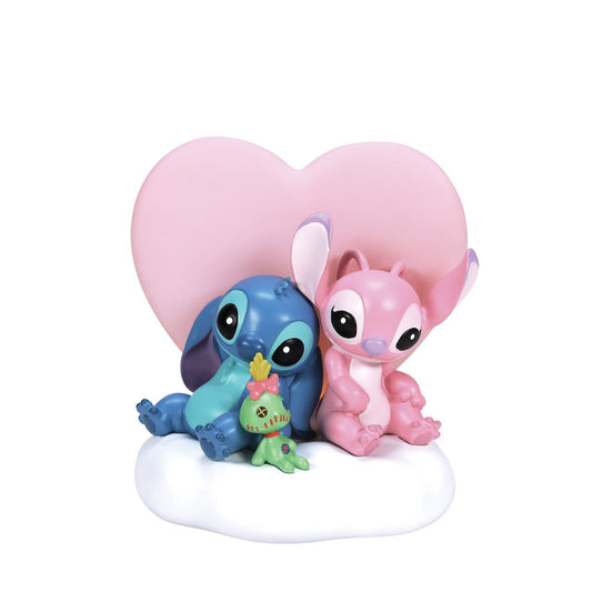 Featuring, Stitch, Angel and Scrump, this cute and cosy scene features a light up pink heart that softly glows. This piece is perfect for any Disney or Stitch fans or in a nursery or bedroom setting.