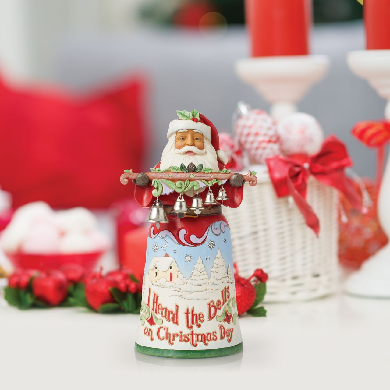 The 18th annual limited edition Song Santa from Jim Shore as part of his Heartwood Creek collection. Featuring hand painted illustrations across Santa's skirt, showing scenes from the iconic song, I Heard The Bells On Christmas Day.