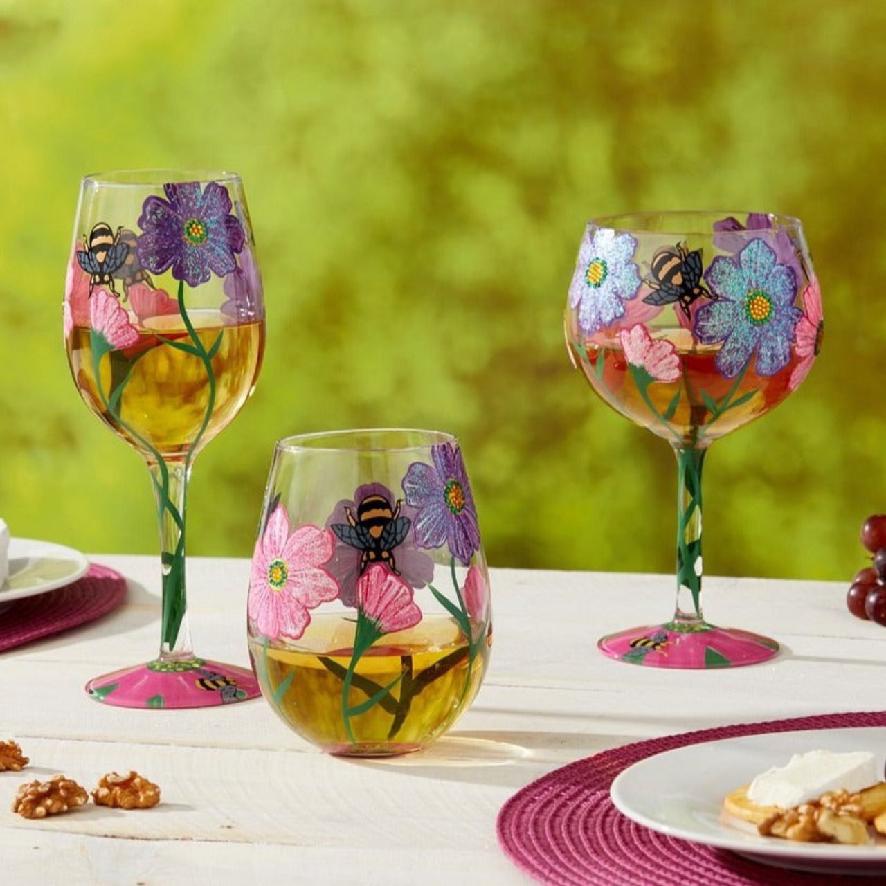 Bring your magical garden to the table with this whimsical wine glass. The perfect complement to any dinnerware style, watch your dinner party blossom into the garden of your dreams. You won't "bee" disappointed.