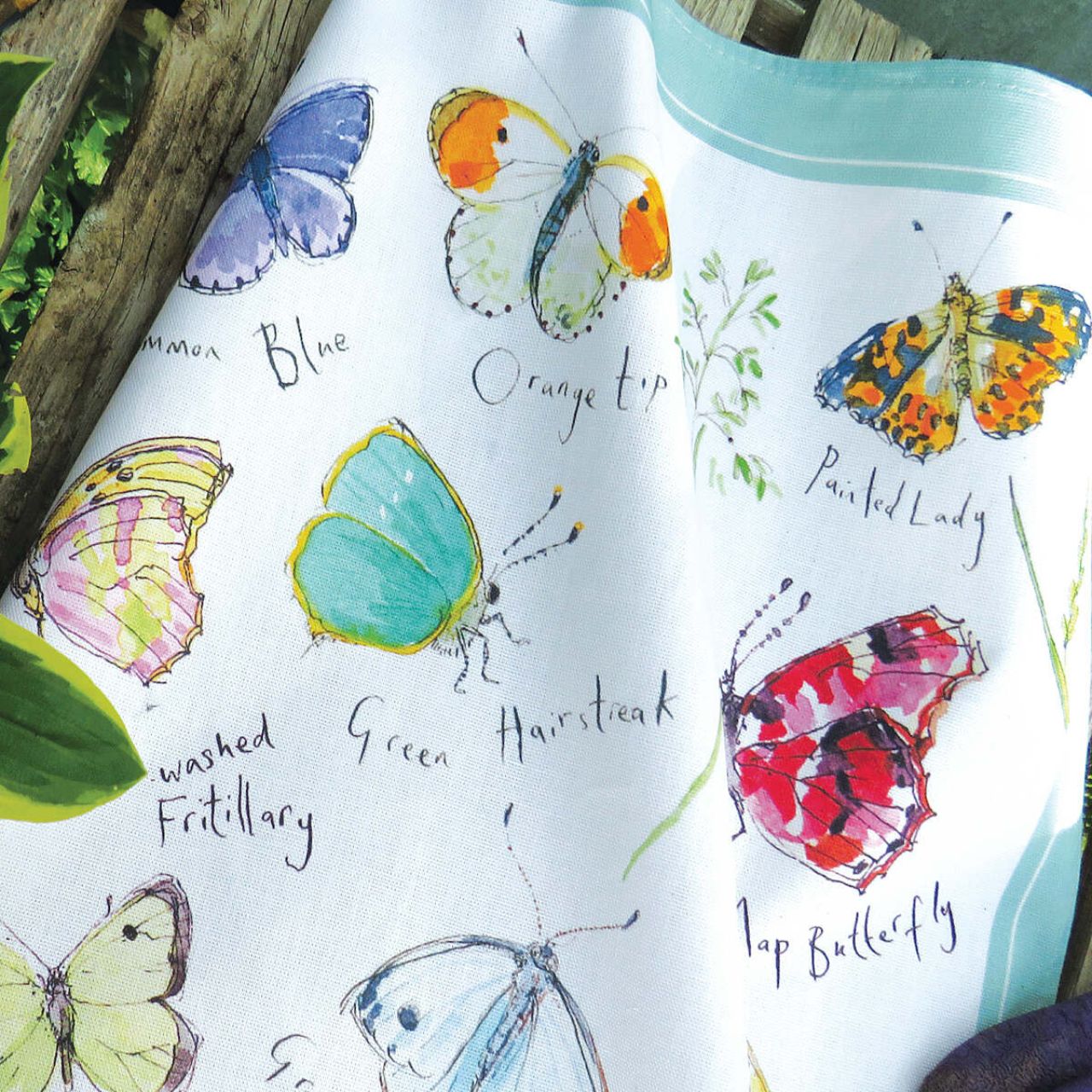 Embrace nature with Madeleine Floyd's beautiful Meadow Butterflies tea towel, as a new addition to our ever growing nature inspired collection. Watch this design come alive with a variety of quaint hand drawn butterfly breeds fluttering across the towel. Complimented by an elegant light teal, each butterfly inherits a range of both bold and pastel tones which create a vibrant and eye-catching appearance.