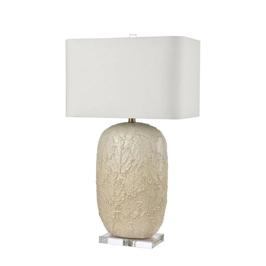 Illuminate your home with our Casla Lamp, featuring a rectangular white crisp shade and leaf pattern base. A truly unique design.