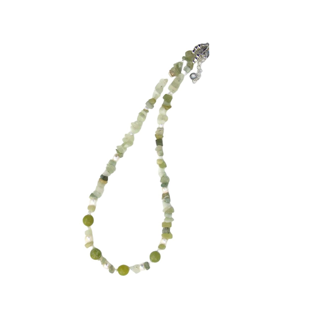 Jade has long been treasured especially in the East for jewellery, statues and trinkets. Its soft green lustre combines beautifully with natural Freshwater Ivory Pearls. This necklace uses a mixture of round Jade beads with a multitude of delightfully irregular chips.