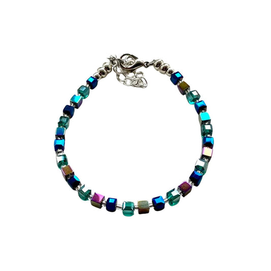 Teal and Blue Faceted Crystal cubes are teamed with purple/green Hematite gemstone cubes to create a vibrant colour combination.