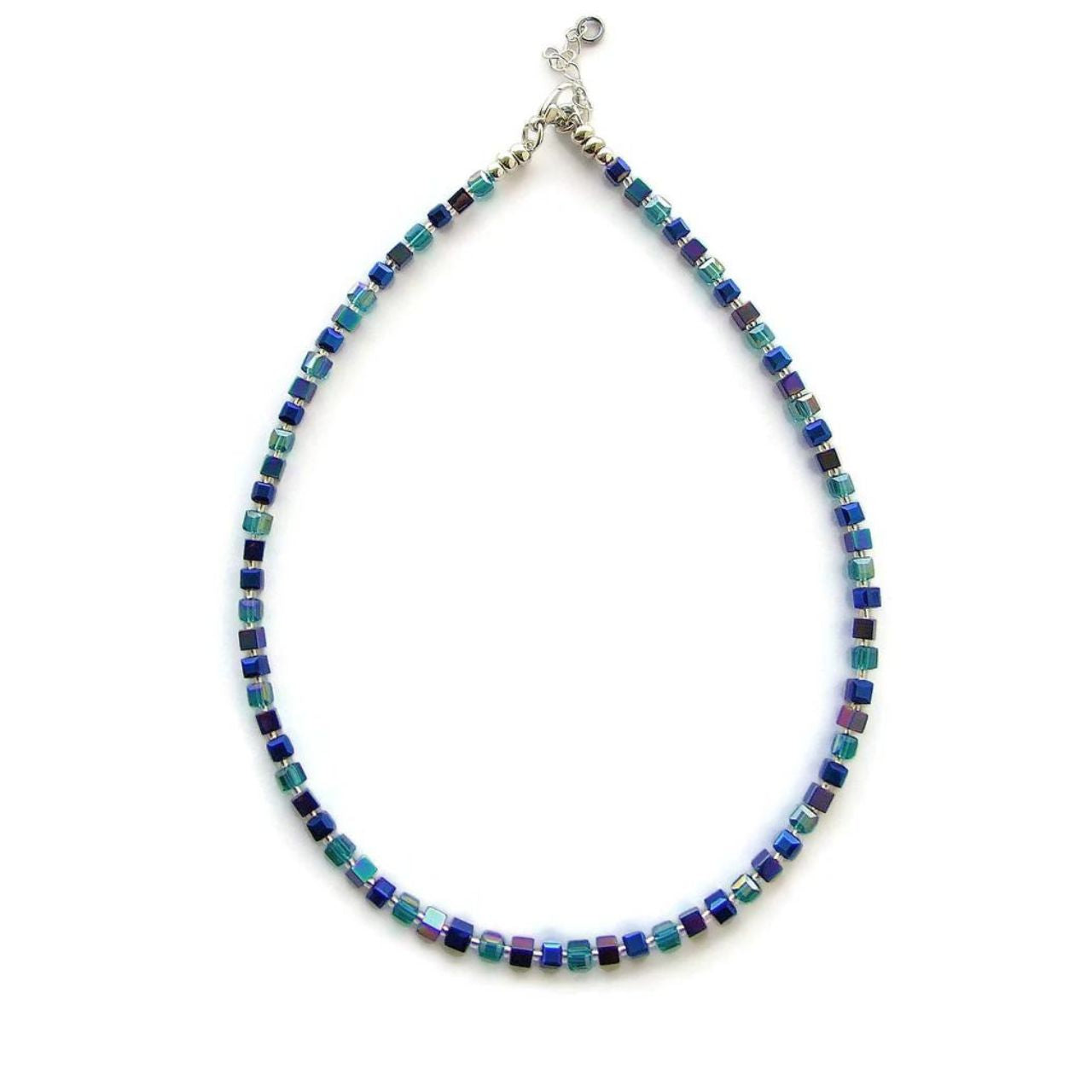 If you are looking for a pop of colour that is still discreet and not too overwhelming this is for you. &nbsp;The colours include vibrant teal in faceted Crystal cubes which have an iridescent AB( Aurora Borealis ) finish coupled with a blue/purple Hematite cube and bright blue Crystal cubes interspersed with little silver-lined clear seed beads. &nbsp;The necklace is lovely and light which makes it easy to wear.