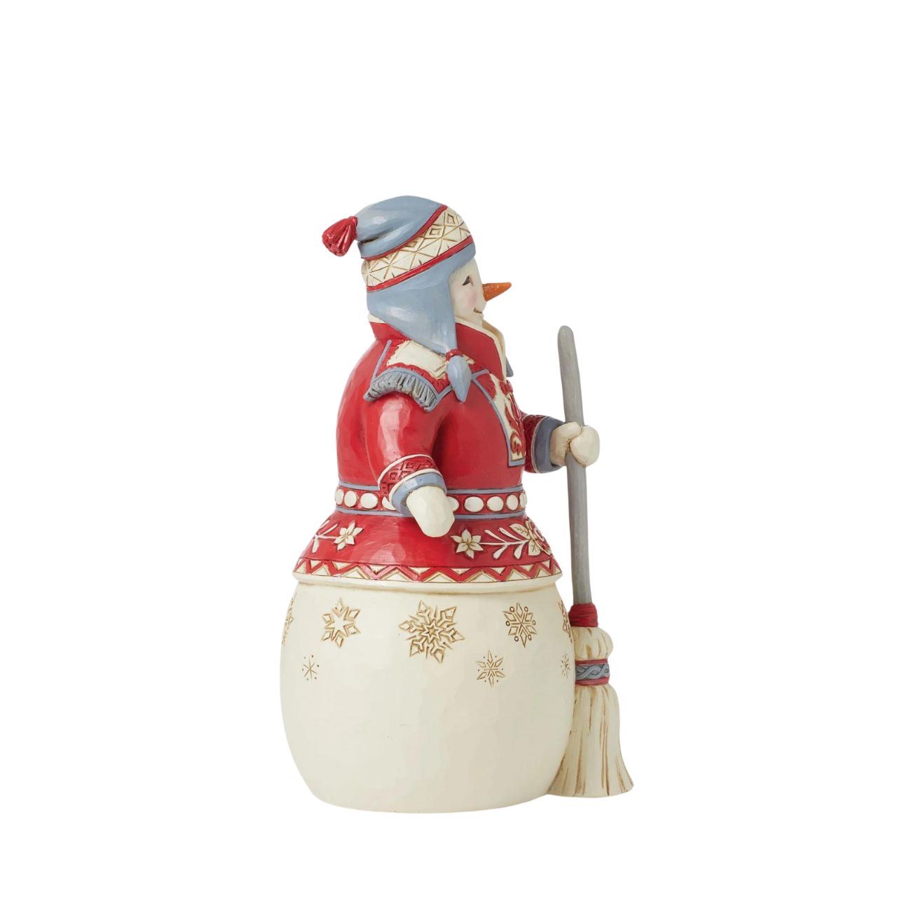 The Nordic Noel Collection showcases a modern twist on Jim Shores whimsical designs; Contrasting red and white colours in Scandinavian patterns, turkey red and Danish architectural trim. This delightful cosy snowman is all ready for some fun in the snow in his cosy jumper, hat and broom.