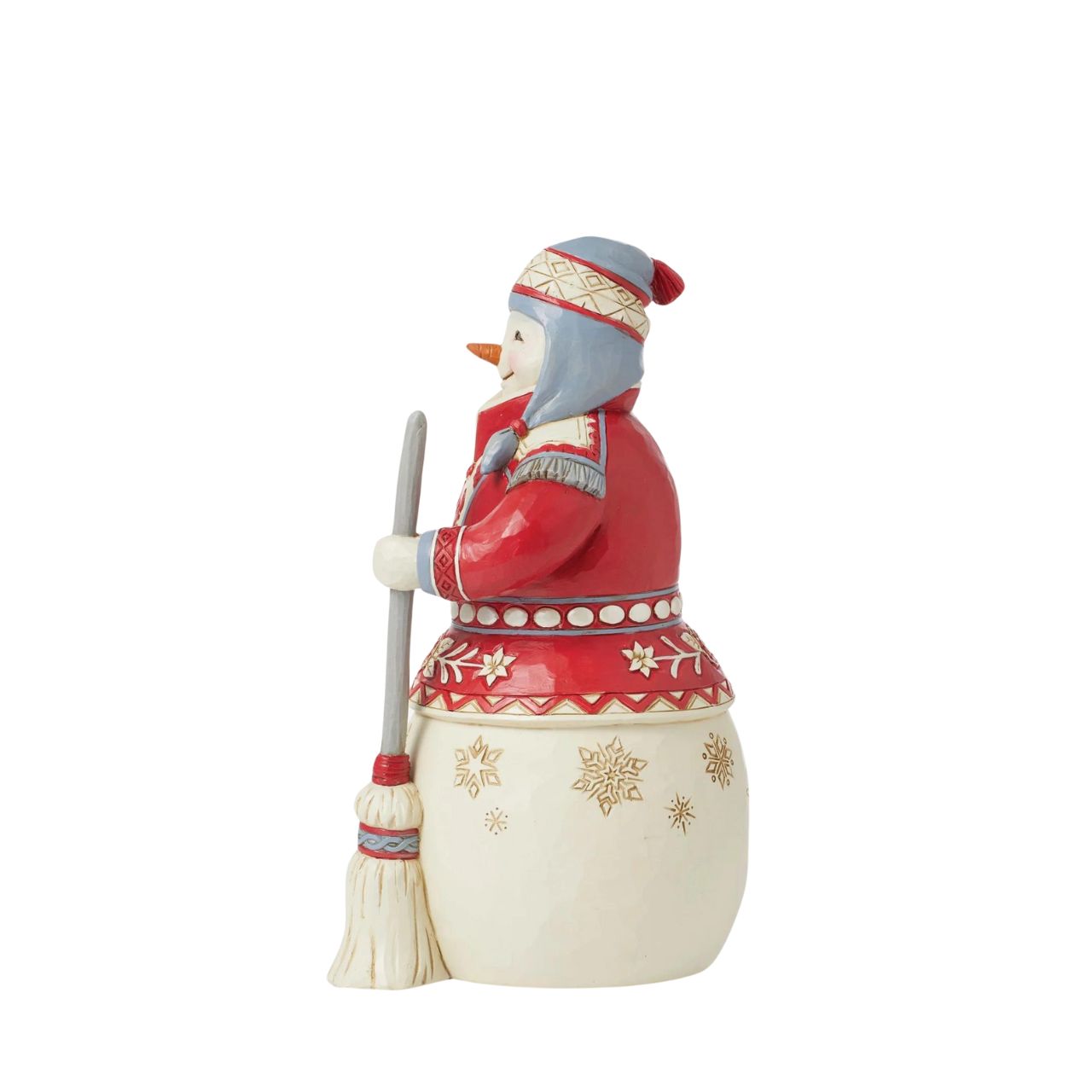 The Nordic Noel Collection showcases a modern twist on Jim Shores whimsical designs; Contrasting red and white colours in Scandinavian patterns, turkey red and Danish architectural trim. This delightful cosy snowman is all ready for some fun in the snow in his cosy jumper, hat and broom.