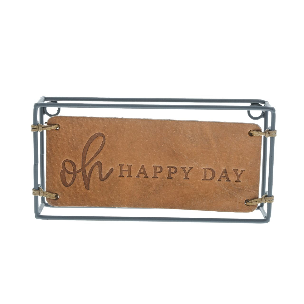 Oh Happy Day Plaque  The Impressions collection expresses appreciation of home and family in enduring leather creations. The Oh Happy Day Plaque adorns the home with an inspiring message. Made of iron and leather.