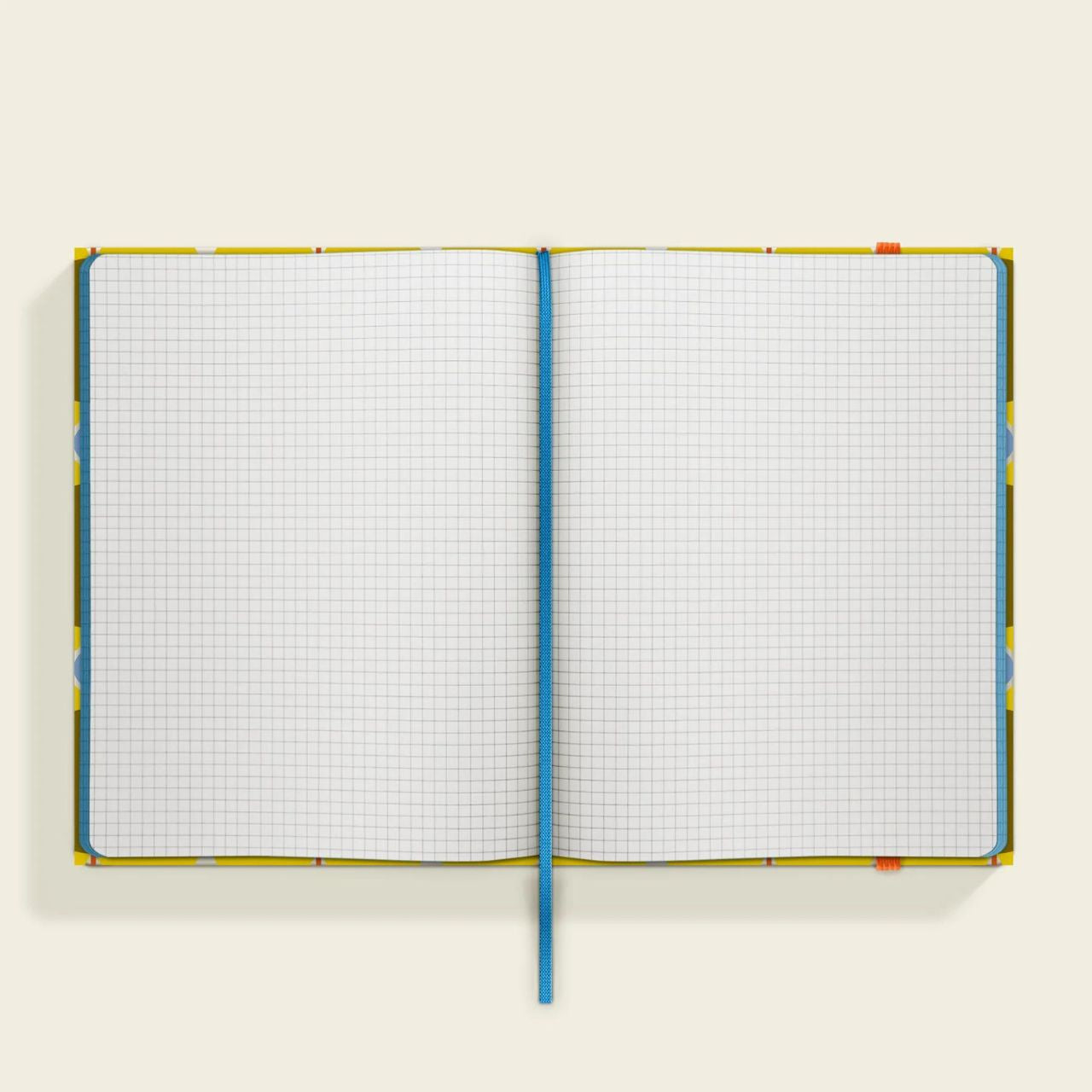 Orla Kiely Medium Notebook - Atomic Flower  Organize your goals, plans, and weekly shopping list in a sleek and stylish manner with our Atomic Flower notebook. Featuring a sturdy hardcover, rounded corners, elastic closure, and matching ribbon bookmark, this notebook also includes a grid square paper layout and an expandable inner back pocket.