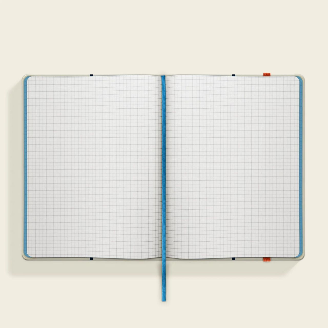 Orla Kiely Botanica Medium Notebook  Organize your goals, plans, and weekly shopping list in a sleek and stylish manner with our Botanica notebook. Featuring a sturdy hardcover, rounded corners, elastic closure, and matching ribbon bookmark, this notebook also includes a grid square paper layout and an expandable inner back pocket.