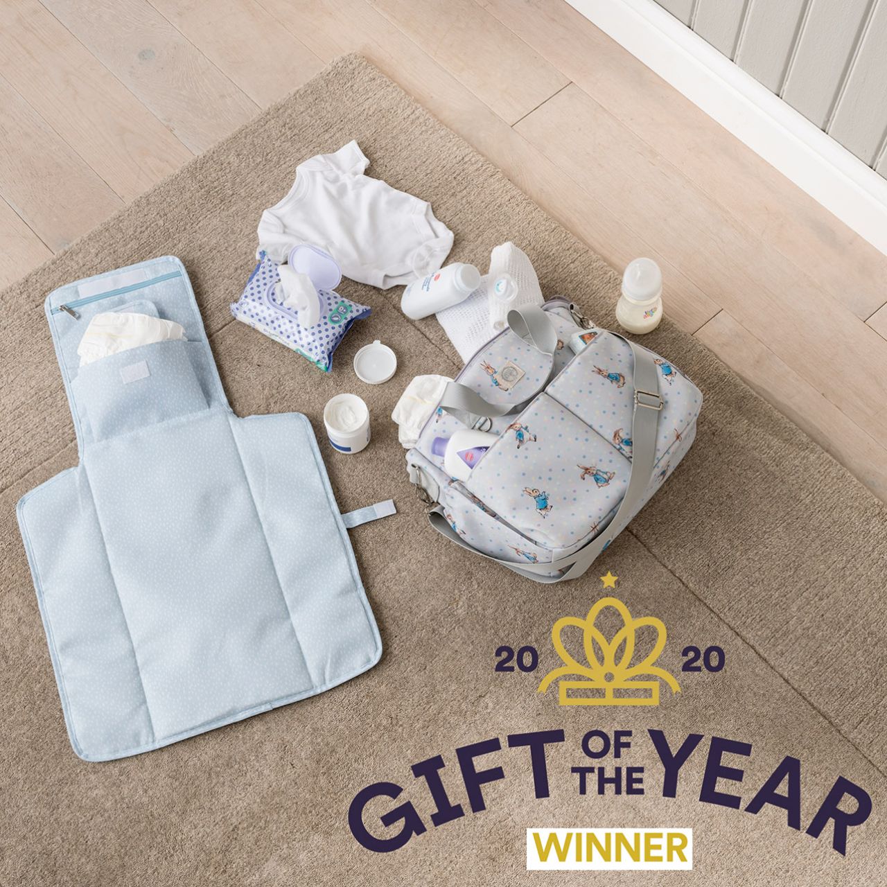 This fold out Peter Rabbit changing mat is both adorable, practical and essential for quick trips out with your baby. The changing mat has been designed to take you seconds to unwrap and use when you are on the go, helping to spend more time on the things you love doing with your baby. 