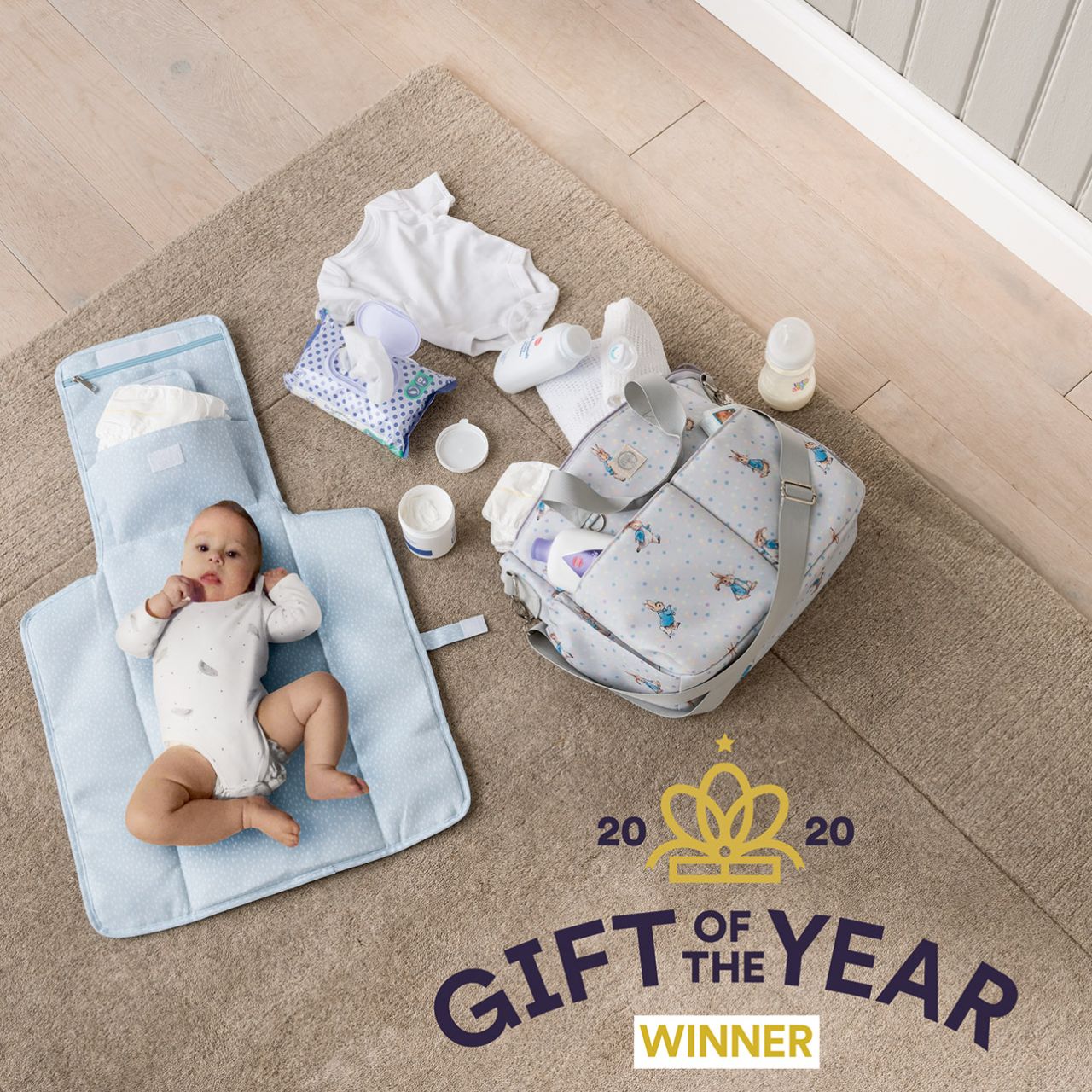 This fold out Peter Rabbit changing mat is both adorable, practical and essential for quick trips out with your baby. The changing mat has been designed to take you seconds to unwrap and use when you are on the go, helping to spend more time on the things you love doing with your baby. 