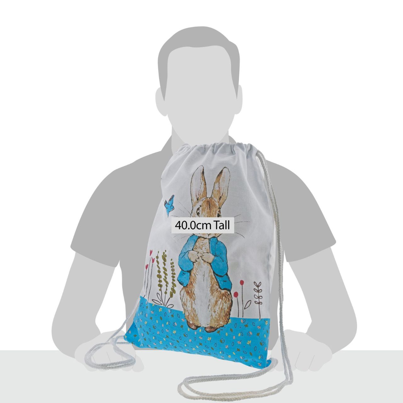 Beatrix Potter Peter Rabbit Drawstring Bag  A beautiful Peter Rabbit cotton drawstring bag. This is a lovely little bag that would make a perfect nursery, or pre-school bag for your child to pop all their school essentials in. It is also a great alternative to a storage bag to place all your little one's toys in, and of course an easy way to take their much loved Peter Rabbit teddies everywhere they go.