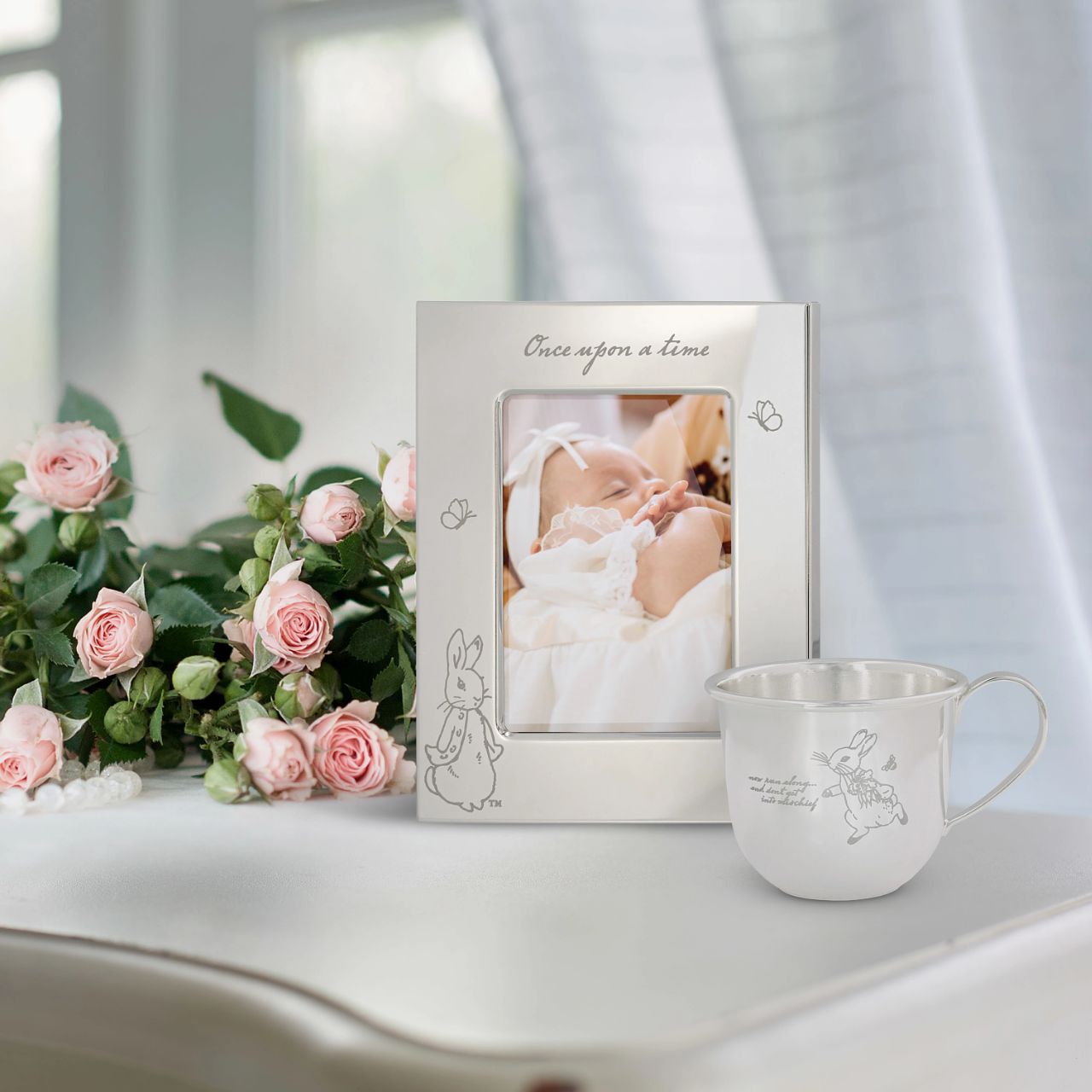 Celebrate a new bundle of joy with the Beatrix Potter New Baby collection. The silver-plated Photo Frame, with an adorable etched Peter Rabbit design, makes a beautiful gift that will be treasured for years to come. 