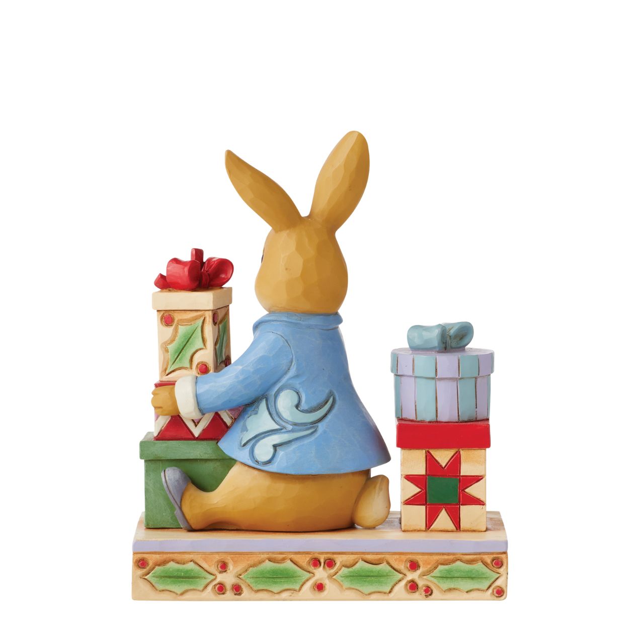 Beatrix Potter Peter with Presents Figurine by Jim Shore  2022 celebrates Peter Rabbit's 120th anniversary. Jim Shore celebrates Beatrix Potter's lovable cast of characters with charming craftsmanship. This endearing figurine features the esteemed Peter Rabbit on Christmas day surrounded by handsomely packaged presents.